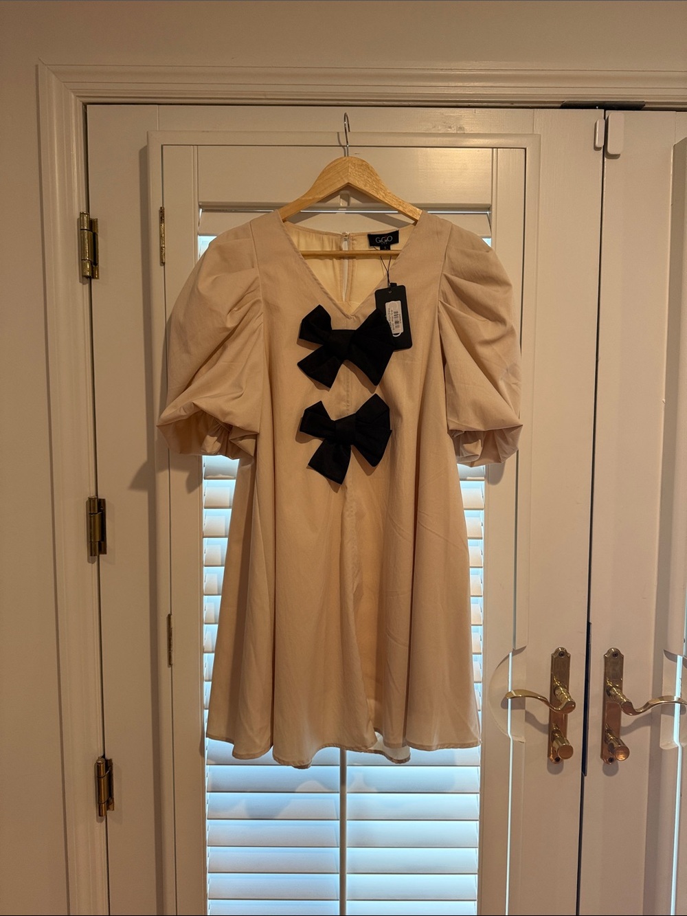 Beige Mini Dress with Black Bow Details
